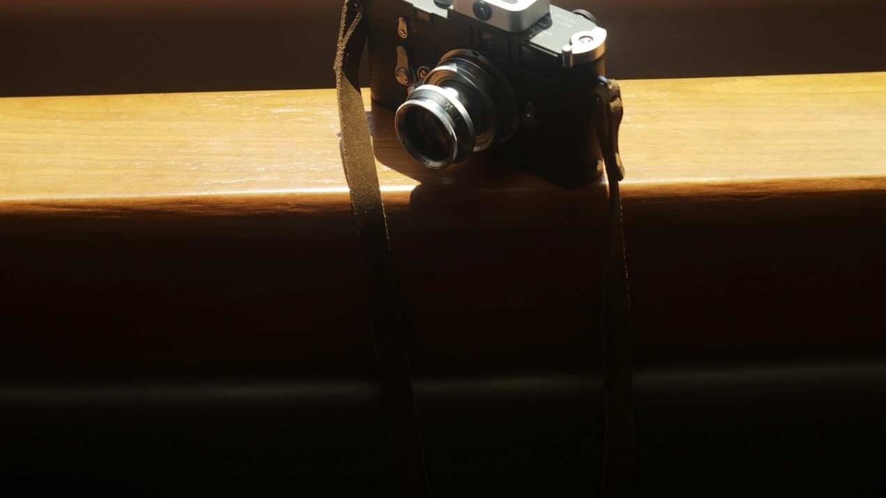 Leica with Summarit 50mm f/1.5 on a sunlit windowsill